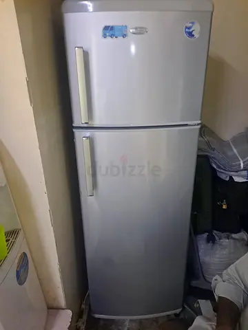 My silver double-door refrigerator (top freezer) - used, working