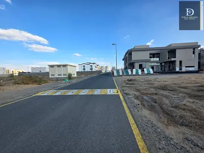 Land for sale in Al Suyoh – close to Dubai + next to Sharjah Grand Mosque and Park, second plot from the corner