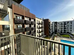 Apartment with balcony overlooking the swimming pool in Maryam Island. 1 bedroom + living room, with