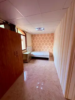 Executive l furnished Half Partition Room for Rent – in Al Muwaihat 3 inside a villa, Ajman