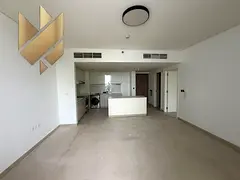 One bedroom and living room, first occupancy in Aljada - Misk 4 building with a large balcony