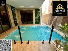 Villa in Al-Amrah area, 7 rooms with swimming pool and roof, including electricity, water and air co