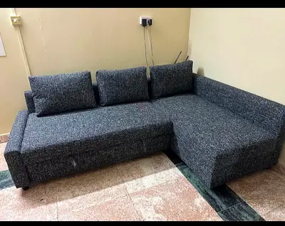 Multi-Function Sofa Bed • Modern L-shape style • Converts into bed quickly • Extra storage space • H