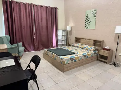 Large Executive Masterbedroom with Balcony  for ladies or couples