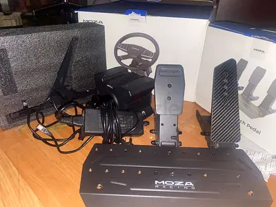 Moza r5 without wheel but with all three pedals the is negotiable