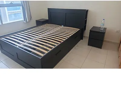 Modern IKEA Bed Frame with Nightstands • High-quality IKEA design • Includes two side tables • Stron