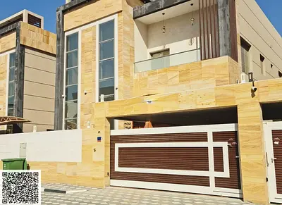 A distinctive villa for sale in Al Yasmin area, including electricity, water, and air conditioning.