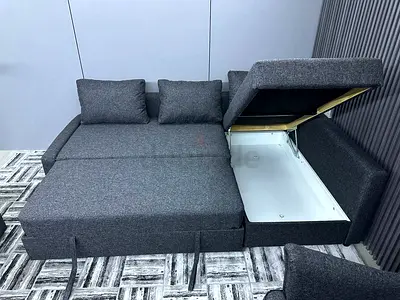 Modern L-Shape Sofa Bed • Stylish and modern design • Converts easily into a comfortable bed • Built