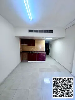 Studio for annual rent With balcony Central air conditioning Located in Al Rawda 2, close to Dubai e