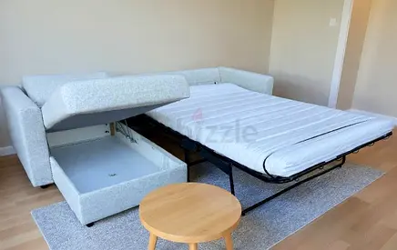 Amazing condition ikea Pull out Gunnared beige L shape sofa bed with mattress