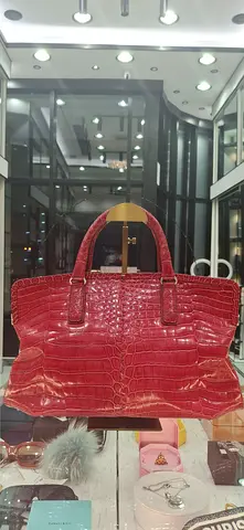 Red croc-embossed leather tote bag - gently used