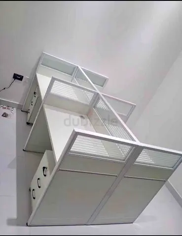 4-person white modular office workstations with under-desk pedestals