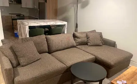 Almost new L-Shaped crate and barrel Sofa