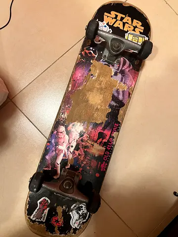 Used Skateboard with Star Wars Design