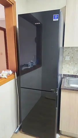 Hitachi Refrigerator for Sale black colour latest model perfect working condition more details conta