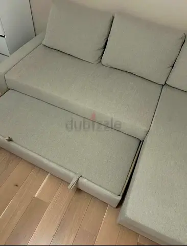 Modern Grey Sofa with Storage Pull-Out