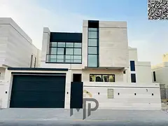 Luxury villa for sale in Al Yasmine - two floors and a rooftop terrace with a modern design, featuri