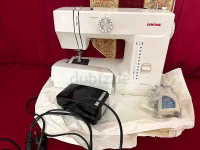 Janome sewing machine with foot pedal and accessories — used, working