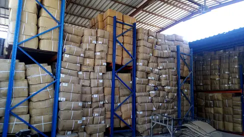 Large Stack of Mops Industrial Packing Boxes