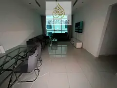 A unique opportunity to rent in Al Khan: a semi-furnished two-bedroom apartment with a living room,
