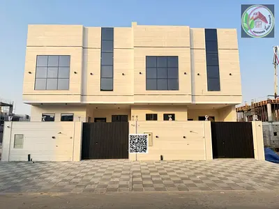Modern stone facade townhouse villa for sale in Al Bahia – Ajman. Freehold ownership | Bank financing or cash | Registration fees included