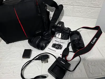 Canon 1200d DSLR camera with 3lens lightly use
