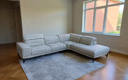 Beige Editon head adjustable L shape sofa like new