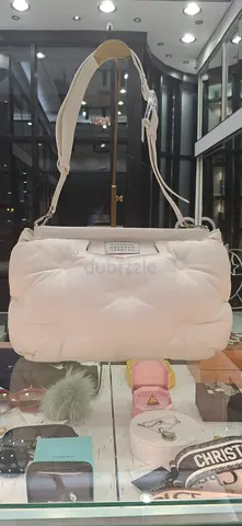 Cream quilted padded shoulder bag — light use