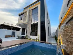 Own your dream two-story villa in the Al Yasmin area, next to Al Hamidiya Park, directly from the ow