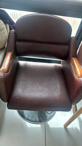 Brown Leather Armchair with Wooden Accents