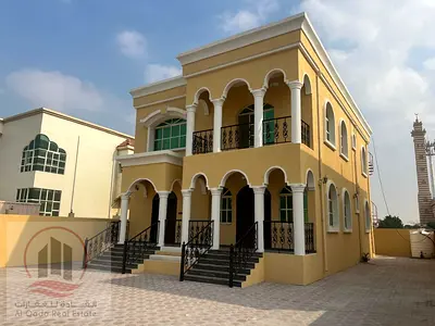 For sale, a villa in Ajman Al Rawda, 5 master rooms, a Majles room, a hall, and a maid’s room, freehold for all nationalities