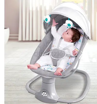 Gently used baby rocker/bouncer with canopy and toy bar