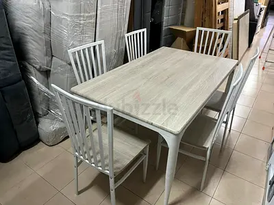 Dining table with six chairs, beige and white color, from Home Box