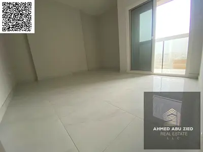 2 bedroom and hall in Al Jurf 3, brand new, 2 bathrooms, balcony with open view, large panoramic view, central AC, free parking, 4 payments