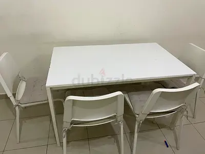 White Dining Table with Four Chairs
