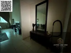 Furnished studio in Al Rashidiya 3, Ajman, large space, bathroom, wardrobes, central AC, 4 payments