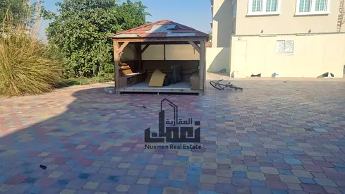 Two-Storey Villa for Sale in Al Rahmaniya 7 | 7 Bedrooms | 2 Living Halls | Majlis | Paved Road