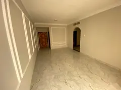 Two bedrooms, a living room, and two bathrooms in Al Nuaimiya 1, behind Al Yasmin Restaurant.
