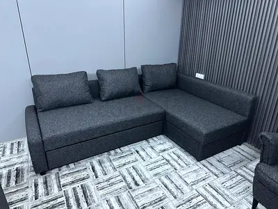 Luxury L-Shape Sofa Bed • Elegant grey colour • Multi-functional sofa and bed • Storage compartment
