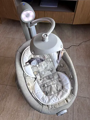 Gently used Joie electric baby swing/rocker with free Coral Baby rocker with canopy from juniors
