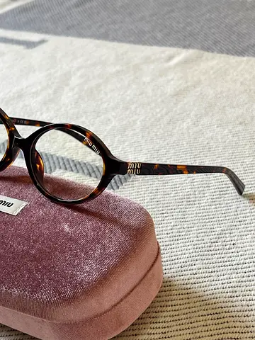 Miu Miu Stylish Eyewear with Case