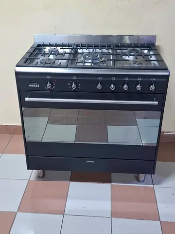 Smeg brand 5 burner top gas oven electric latest model black colour