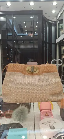 Beige woven handbag with gold turn-lock (gently used)