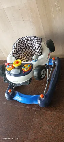 Baby walker with activity toy tray (used, working)