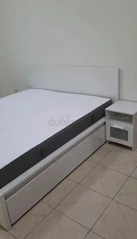 IKEA malam queen‑size bed (160 × 200 cm) with 2 storage drawers underneath and an IKEA mattress ✨