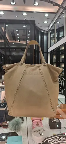 Beige leather tote bag, roomy and gently used