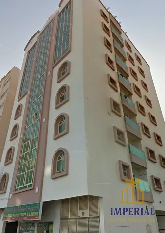 🏢 بناية للبيع في عجمان الصناعية 2، أرضي +8، 32 شقة غرفتين وصالة ومحلات، دخل 852 ألف سنوي، موقع استثماري مميز