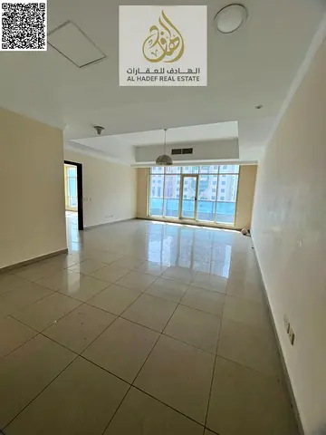 شقة 3 غرف وصالة للإيجار | التعاون – الشارقة | تكييف مجاني | جيم ومسبح | 4 دفعات | 70,000 درهم