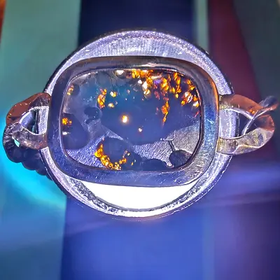 SERICHO PALLASITE METEORITE IN A PURE SILVER BRACELET