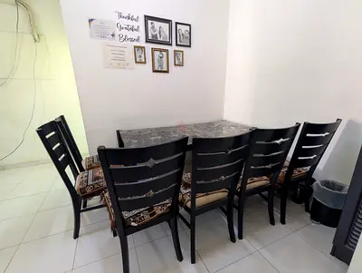 My 6-Seater Black Wooden Dining Set with Cushioned Chairs